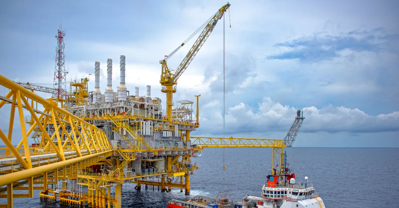stock image of yellow oil and gas facility