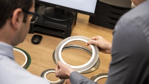 this image shows klinger united kingdom employees providing each other with technical support for gasket selection