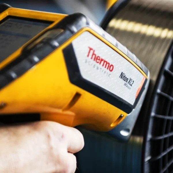 KLINGER employee conducting quality check safety sustainability hero image