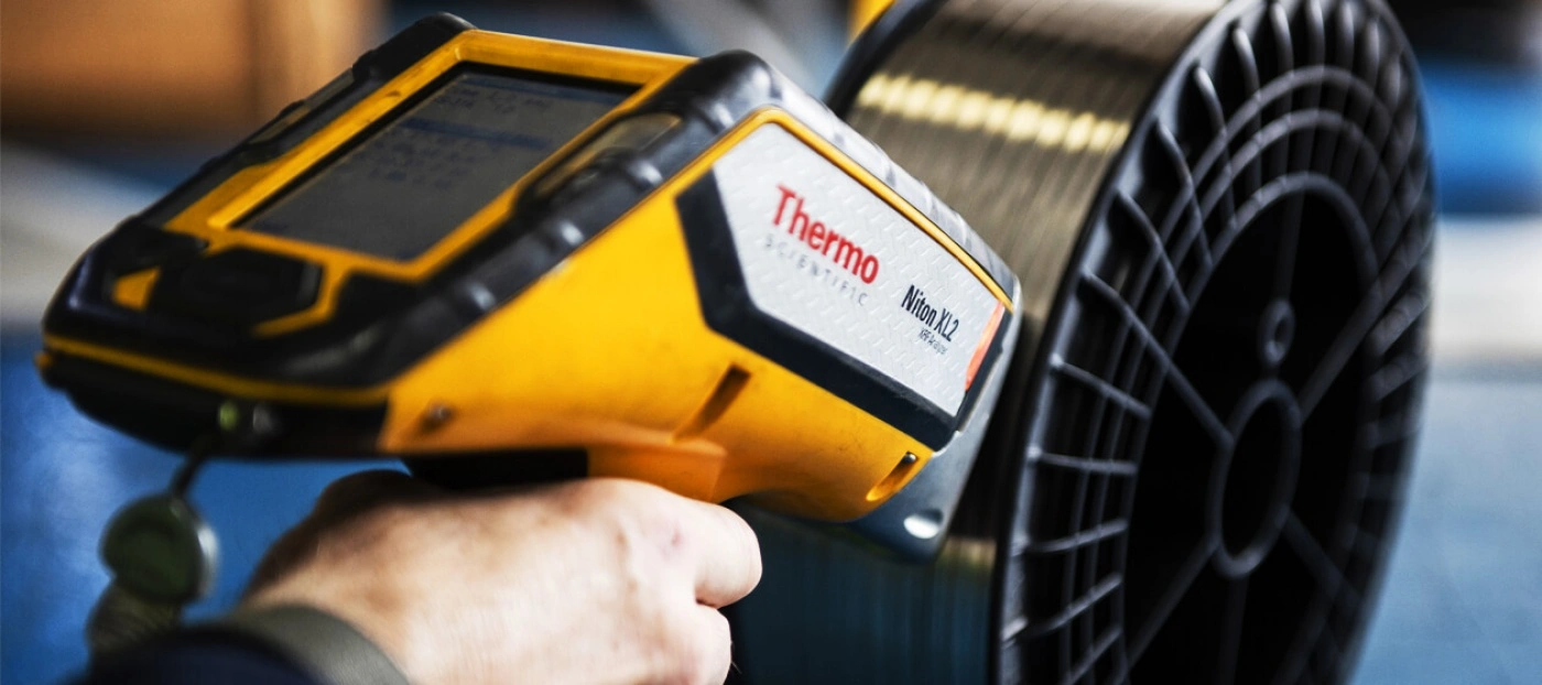 KLINGER employee conducting quality check safety sustainability hero image